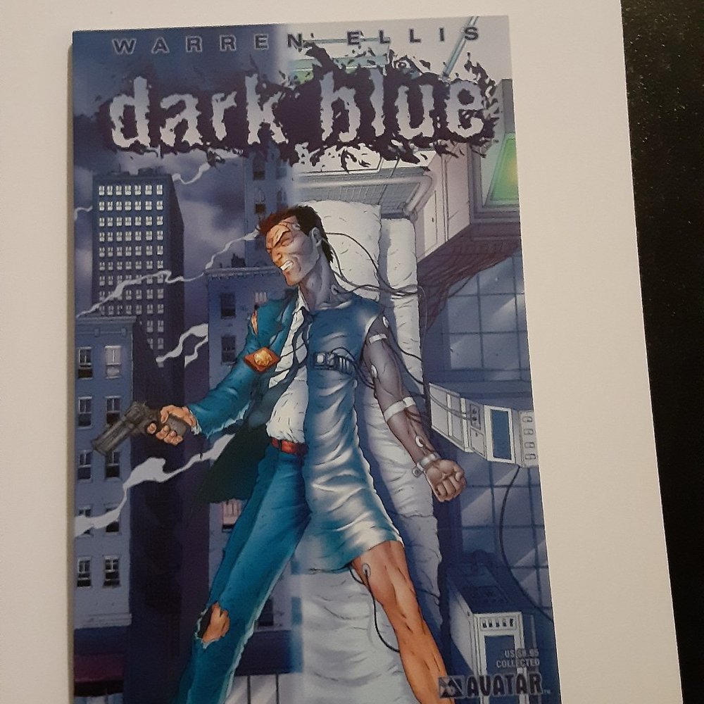 DARK BLUE GRAPHIC NOVEL BY WARREN ELLIS